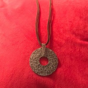 Pressed pewter on leather necklace